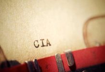 Close-up of a typewritten document labeled 'CIA'