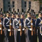 Uniformed soldiers in formation during a military parade