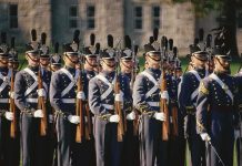 Uniformed soldiers in formation during a military parade