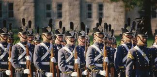 Uniformed soldiers in formation during a military parade