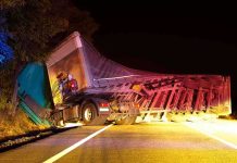 Fatal Crash Sparks Immigration Policy FURY An overturned truck on the side of the road at night with emergency lights