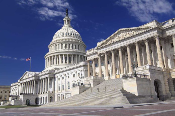 shutterstock_193931348 The U.S. Capitol building with its dome and columns under a blue sky