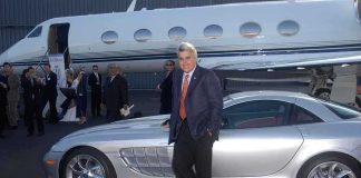 Wealth Shift: RICH GO BOLD in 2026! A man in a suit poses next to a silver luxury car in front of a private jet