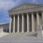 CIA’s Mysterious JFK Files Grab Stuns! The Supreme Court building featuring large columns and statues