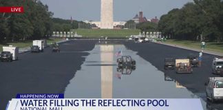 Lincoln Memorial Reflecting Pool fills with water after work, repainting