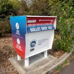 Ballot drop box in a parking lot