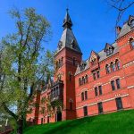 Catholic Seminary Becomes Center of New Zoning War Historic red brick building with tower on a sunny day