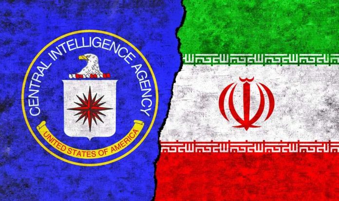 shutterstock_2316844695 CIA emblem alongside the flag of Iran, divided by a textured background