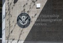 Sanctuary Showdown Erupts — Chaos In Congress Signage for U.S. Citizenship and Immigration Services on a building