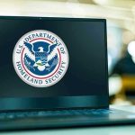 20 Port Authority Workers Make Over $400K Including 17 Cops Laptop displaying U.S. Department of Homeland Security logo.