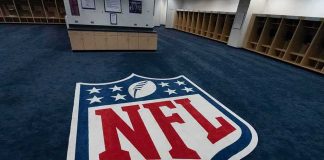NFL End Zones Get Political—Again NFL logo on the floor of an empty locker room