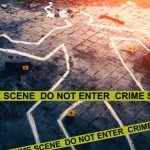 crime scene outline on tiled floor with evidence markers and tape
