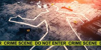 crime scene outline on tiled floor with evidence markers and tape