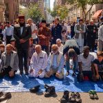 Dearborn Imams Call for Death of Jews Christians and Americans People praying together on a city street
