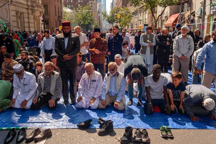People praying together on a city street