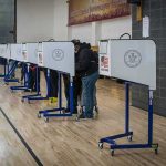 Sewer Socialists Built More Than Pipes Voters at polling booths in a gymnasium