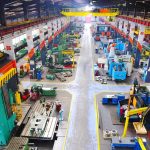 Rubio Blames Washington For Killing Factories Aerial view of a large industrial workshop filled with various machinery and equipment