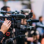 5 Ways Republicans Benefit From Socialist Victories Video cameras on tripods at a media event