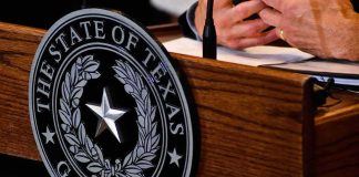 Texas governor seal on wooden podium