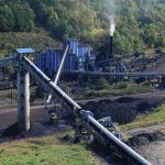 Steel Backbone SHATTERED – Ukraine’s Industry Goes Dark Coal processing plant with conveyor belts in a forested valley