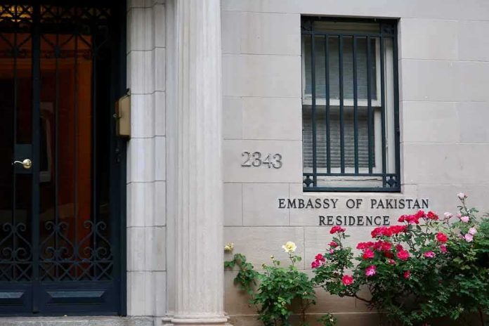 Embassy residence entrance with barred window and roses