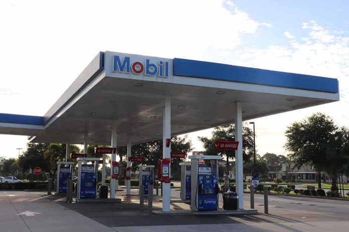 Mobil gas station with multiple pumps under a large canopy