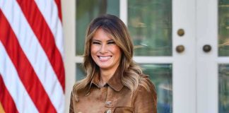 Melania Trump’s UN Power Play Stuns Tech Industry woman smiling in a brown suede coat
