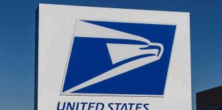 Why Federal Courts Are Split On Gun Bans At Post Offices USPS logo on an outdoor sign