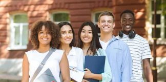 Group of students standing outside a campus building