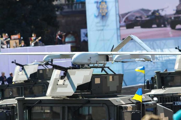 shutterstock_2034373115-1 Military drone mounted on armored vehicle