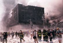 9/11 ‘Man in the Red Bandana’ Receives Medal of Freedom Emergency responders and civilians amidst debris at a disaster site