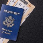 US passport with boarding passes on a dark surface