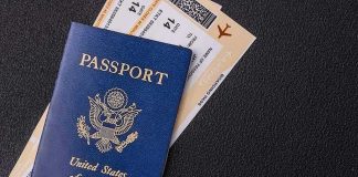 U.S. Visa Ban Creates an Awkward UN Problem US passport with boarding passes on a dark surface
