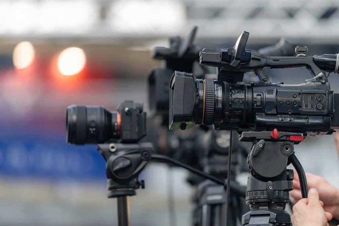 shutterstock_2762343045-6 Professional video cameras on tripods