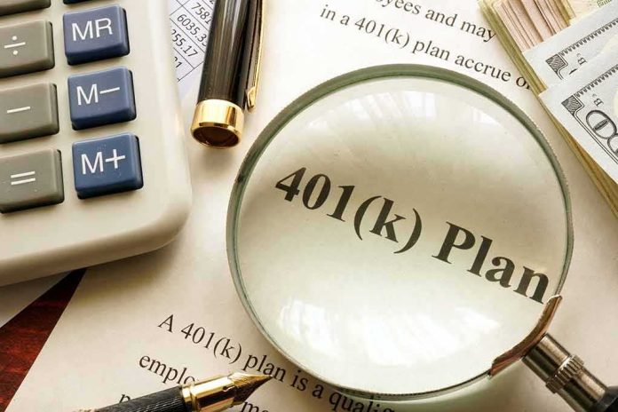 shutterstock_593390546 401(k) plan document under magnifying glass