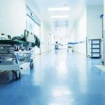 Comedian Carrot Top Hospitalized Hospital corridor with empty gurney
