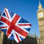 Princess Diana’s Brother Makes Explosive Claims Against Charles Union Jack flag with Elizabeth Tower in the background