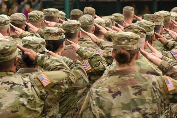 Soldiers in camouflage uniforms salute in formation
