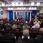 Karoline Leavitt Announces Surprise Exit From White House Press secretary at podium addressing reporters in briefing room