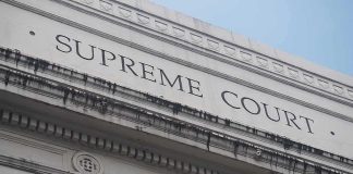 Teen Wrestler Takes Explosive Case to SCOTUS Supreme Court building facade with classical columns