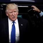 Trump Opens Up About Pardoning HIMSELF Donald Trump stepping out of a vehicle in a suit and blue tie