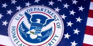DHS Says New York Shielded Accused MURDERERS U.S. Department of Homeland Security seal on American flag