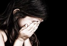 3 Kids RESCUED After Alleged Years-long Abuse Child covering face with hands