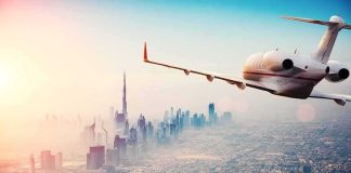 Flydubai Suspect’s Past Gets MUCH Darker Private jet flying over a modern city skyline at sunrise