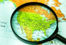 The Gulf Could Be Facing Serious New Threat Magnifying glass focusing on a map of the United States