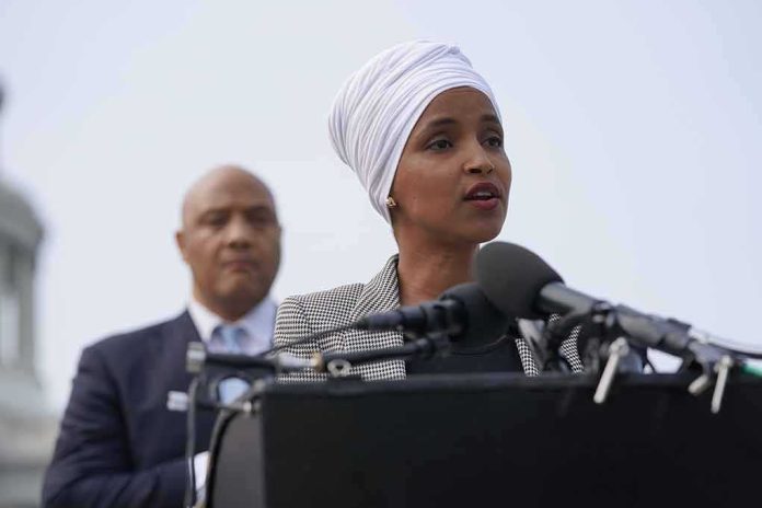 Ilhan Omar speaking at a podium with André Carson standing behind