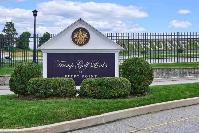 shutterstock_2195613443 Entrance sign at a golf course with manicured shrubs