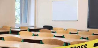 Teacher Accused of DRAGGING Student 20 Feet Empty classroom with police tape across desks