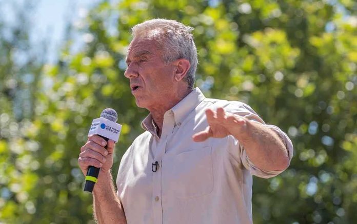 Robert F. Kennedy Jr. speaking outdoors with a microphone